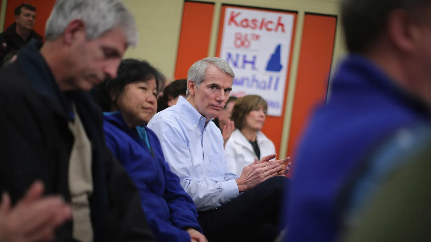 Senator Rob Portman applauds during a town hall meeting with Republican presidential candidate John Kasich on Jan. 31, 2016, in Bow, New Hampshire.
