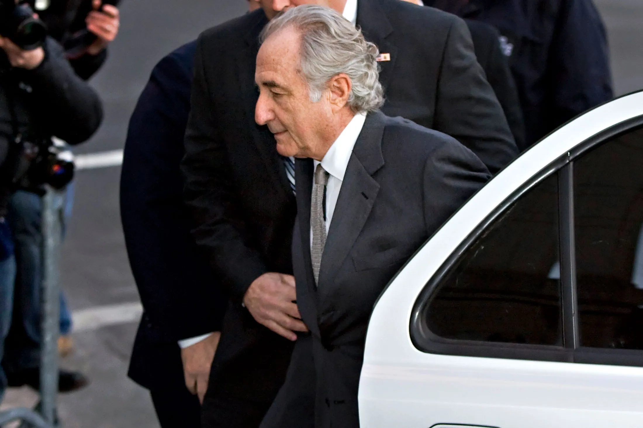 Bernard Madoff is escorted into Federal court in New York, on March. 12, 2009.
