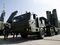 Russian soldiers examine the S-400 Trium
