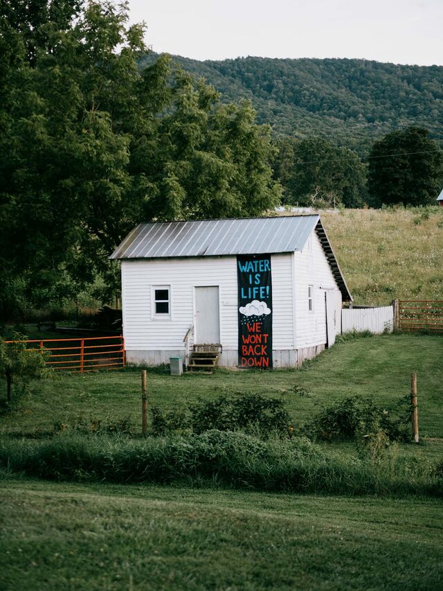Lindside WV (Monroe County) A sign declaring "Water is life!" hangs on one of the outbuildings on Becky Crabtree's farm.