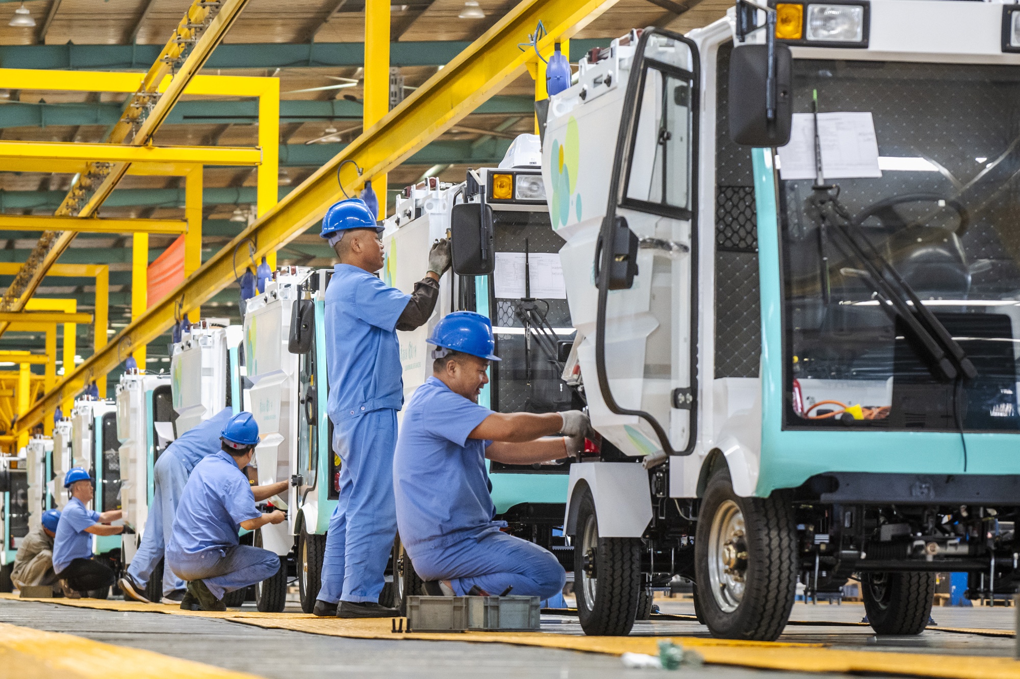 Workers Assemble Electric Sweeper In Wuhu