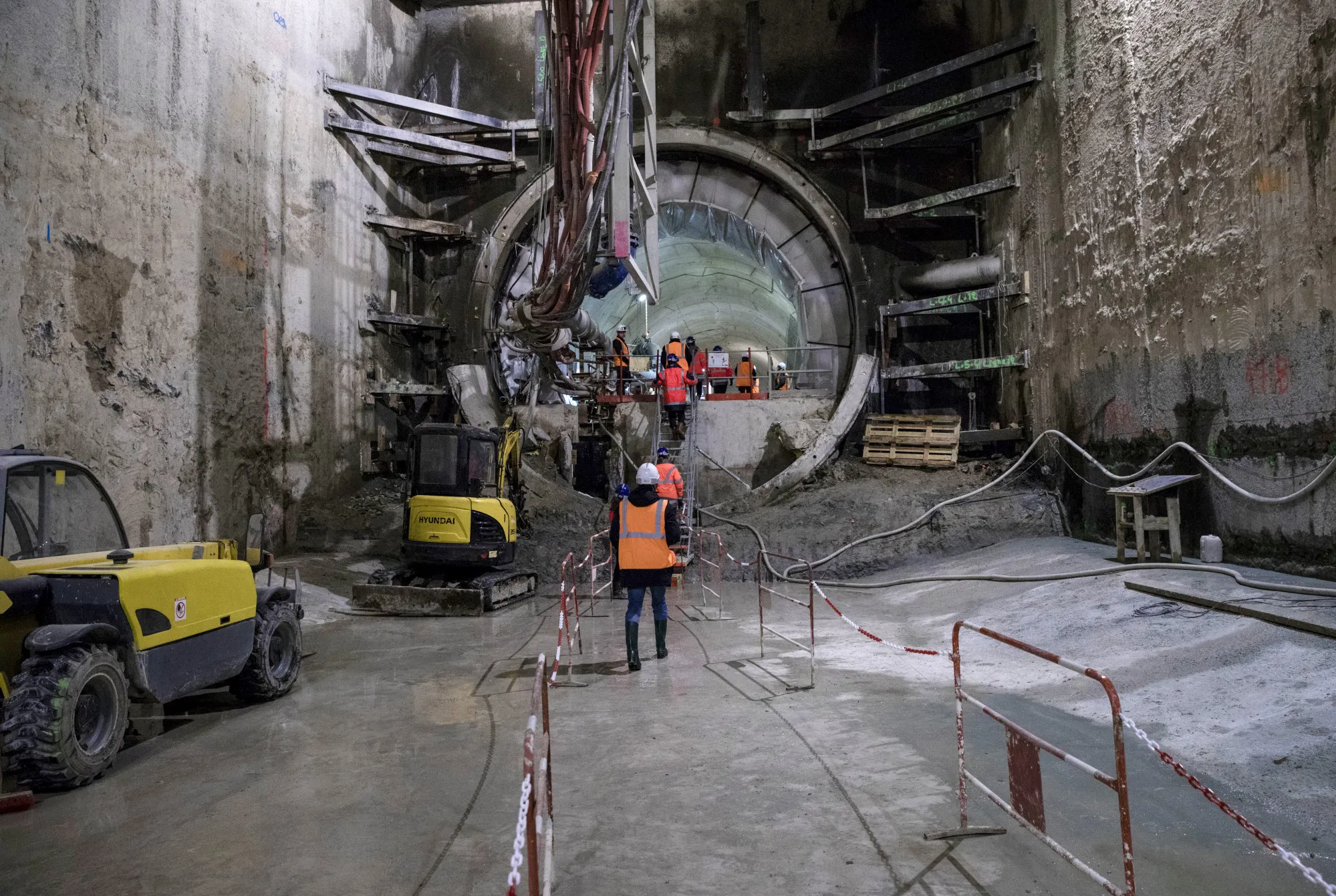 Attendees pass through a tunnel during a tour of the Paris Metro subway railway line 12 expansion project being undertaken by Vinci SA in Aubervilliers, near Paris, France, on Tuesday, Jan. 16, 2018. The situation with U.K. builder and services company Carillion, that filed for liquidation, "reveals how absurdly this profession operates in the U.K," Vinci chief executive officer Xavier Huillard told reporters in Paris on Tuesday.