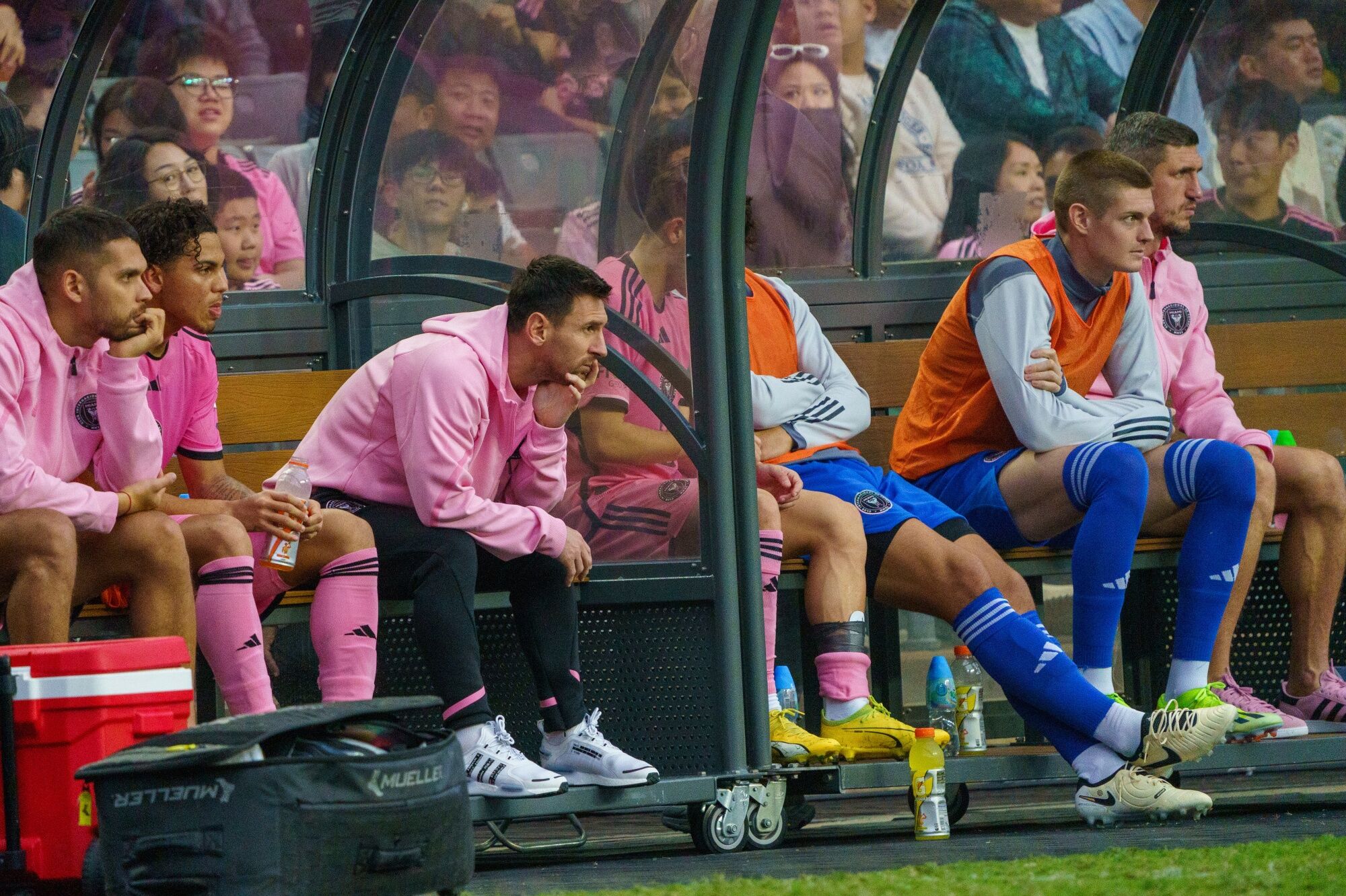 Lionel <b>Messi</b>, third left, on the bench on Feb. 