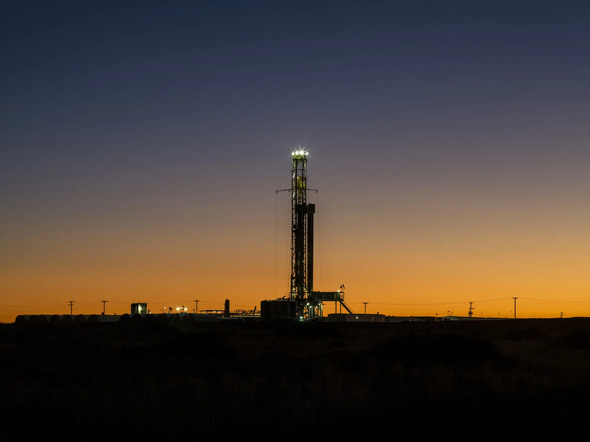 A drilling rig operates near Midland, Texas.