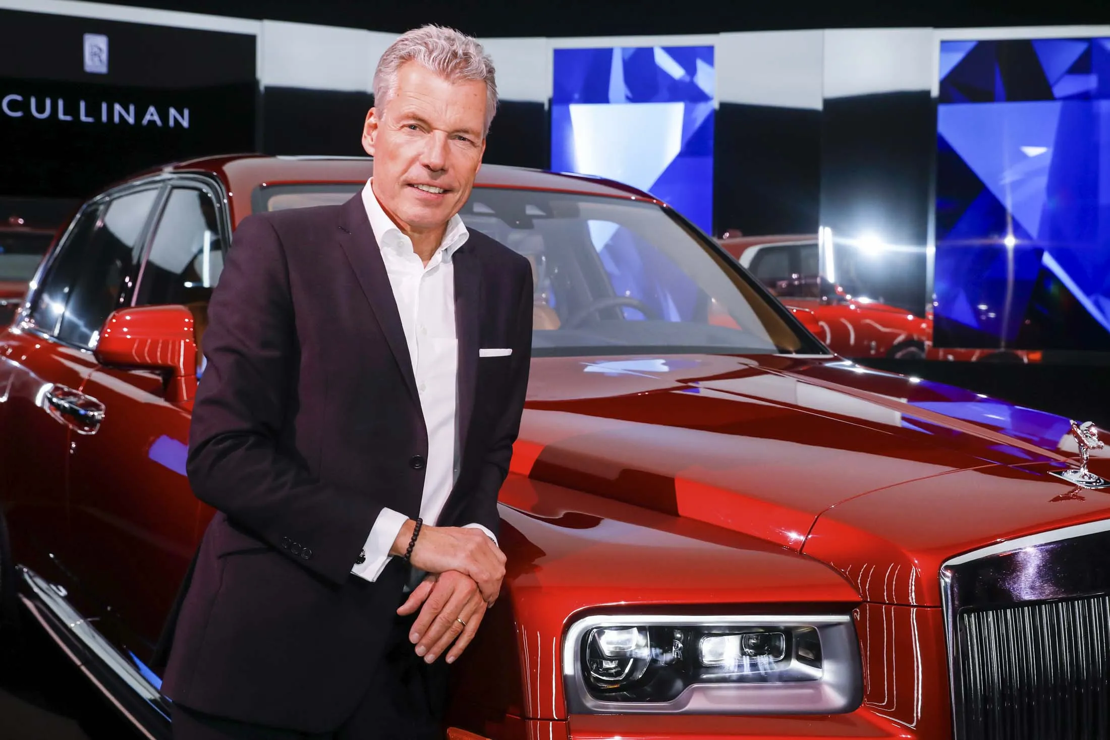 CEO Torsten Müller-Ötvös poses with the Rolls-Royce Cullinan SUV at its media launch in Chichester, U.K. Named after the largest discovered diamond, the $325,000 vehicle is the latest in a long line of six-figure big rigs from the world’s most prestigious automakers.