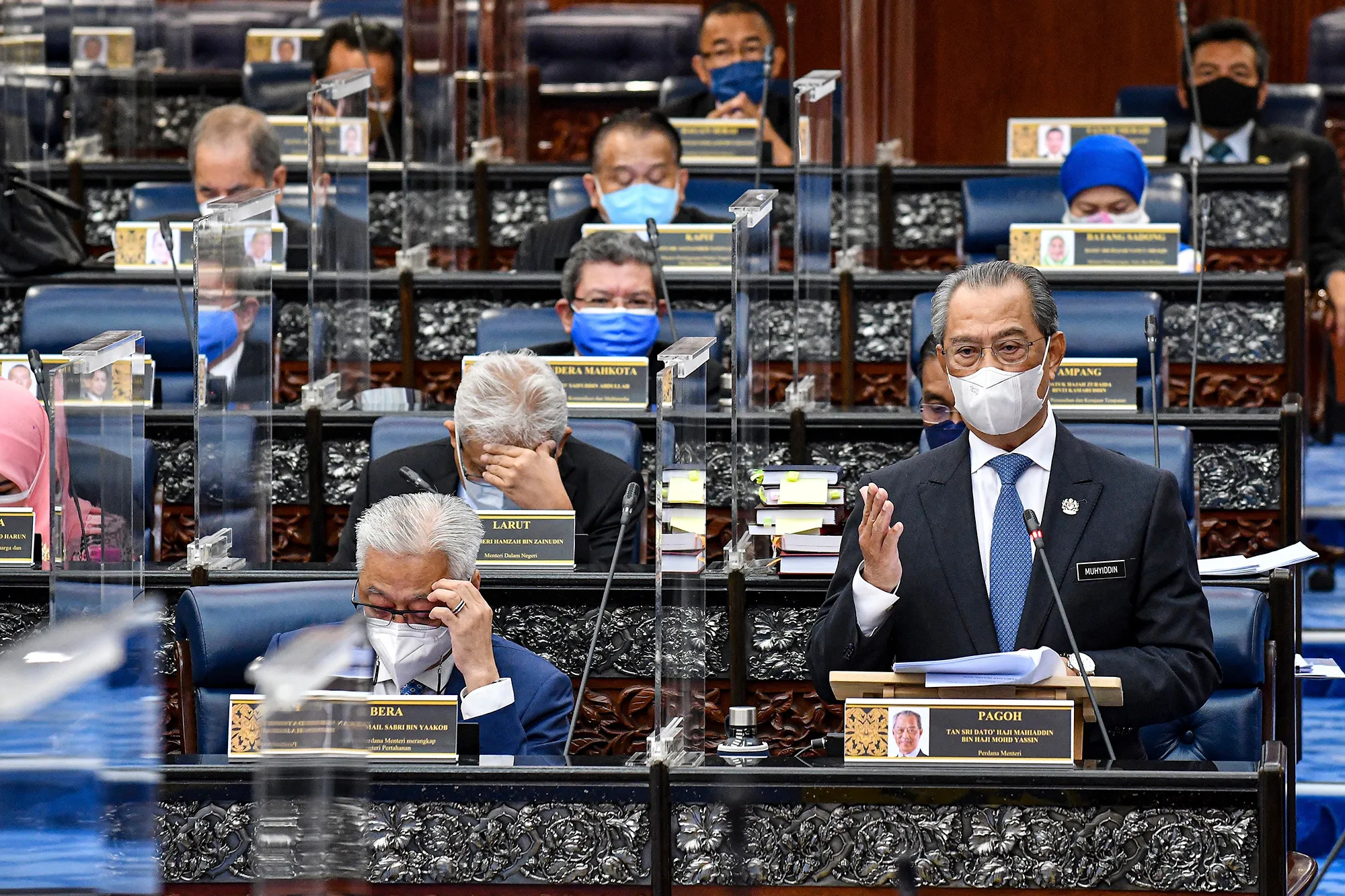 Muhyiddin Yassin&nbsp;speaks during a session&nbsp;at parliament house in Kuala Lumpur, on July 26.