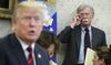 John Bolton listens as Donald Trump speaks in the Oval Office of the White House in Washington, D.C., on May 22, 2018.