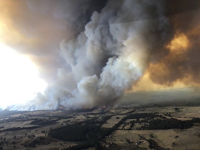 Wildfires rage under plumes of smoke in Bairnsdale, Victoria on Dec. 30, 2019.