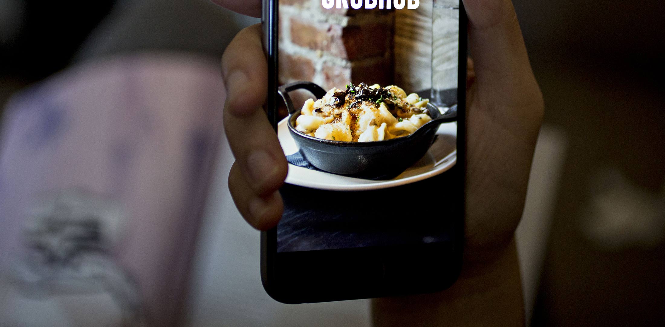GrubHub Inc. application is demonstrated for a photograph on an Apple Inc. iPhone in Washington, D.C., U.S., on Saturday, Feb. 4, 2017. GrubHub is scheduled to release earnings figures on February 8.