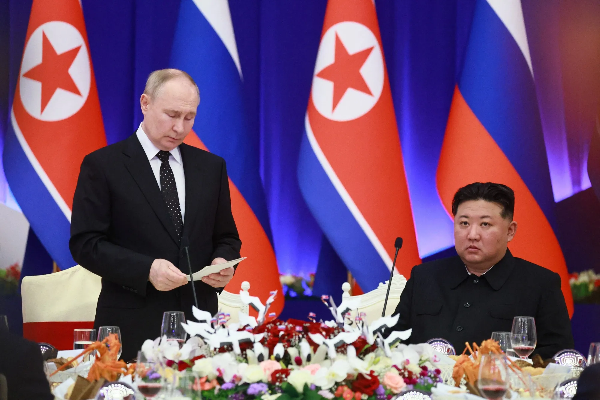 Vladimir Putin and Kim Jong Un during a reception in Pyongyang on June 19, 2024 in a pool photograph distributed by the Russian state agency Sputnik.