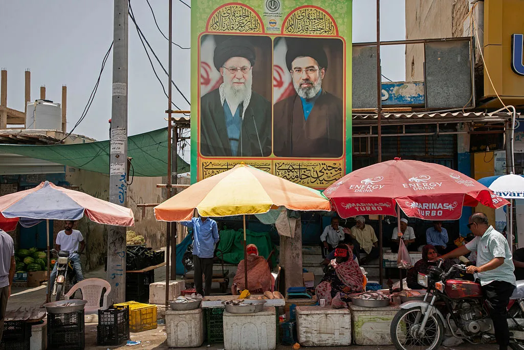 Posters of the former Supreme Leader Ali Khamenei and the current Supreme Leader Mojtaba Khamenei, in Tehran,&nbsp;on May 17.