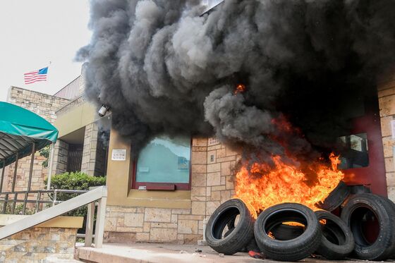 Honduras Unrest Spreads as Protesters Burn Tires at U.S. Embassy