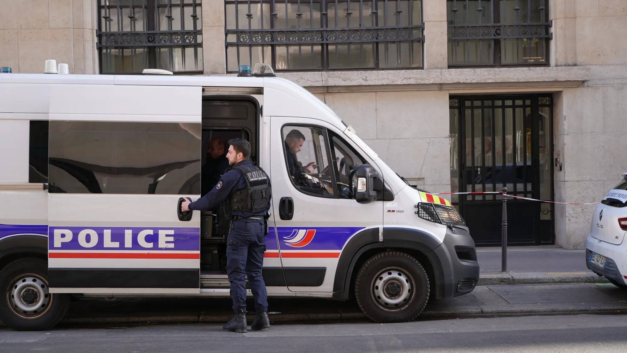 Police outside the Bank of America offices in Paris, on March 28.
