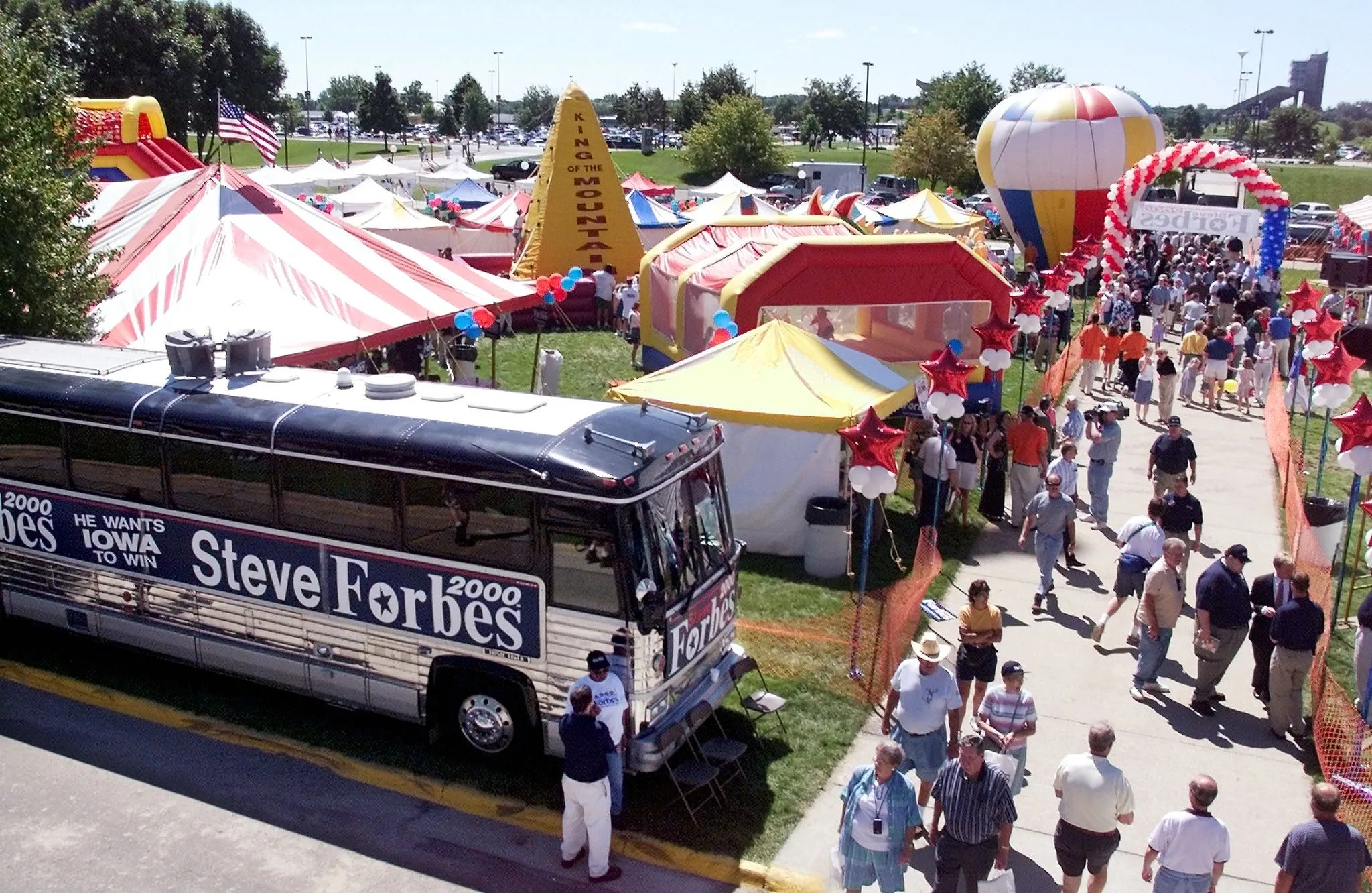 Republican voters make their way through the recreational area set up by Republican presidential candidate Steve Forbes on the grounds of Iowa State University 14 August 1999 in Ames, Iowa.
