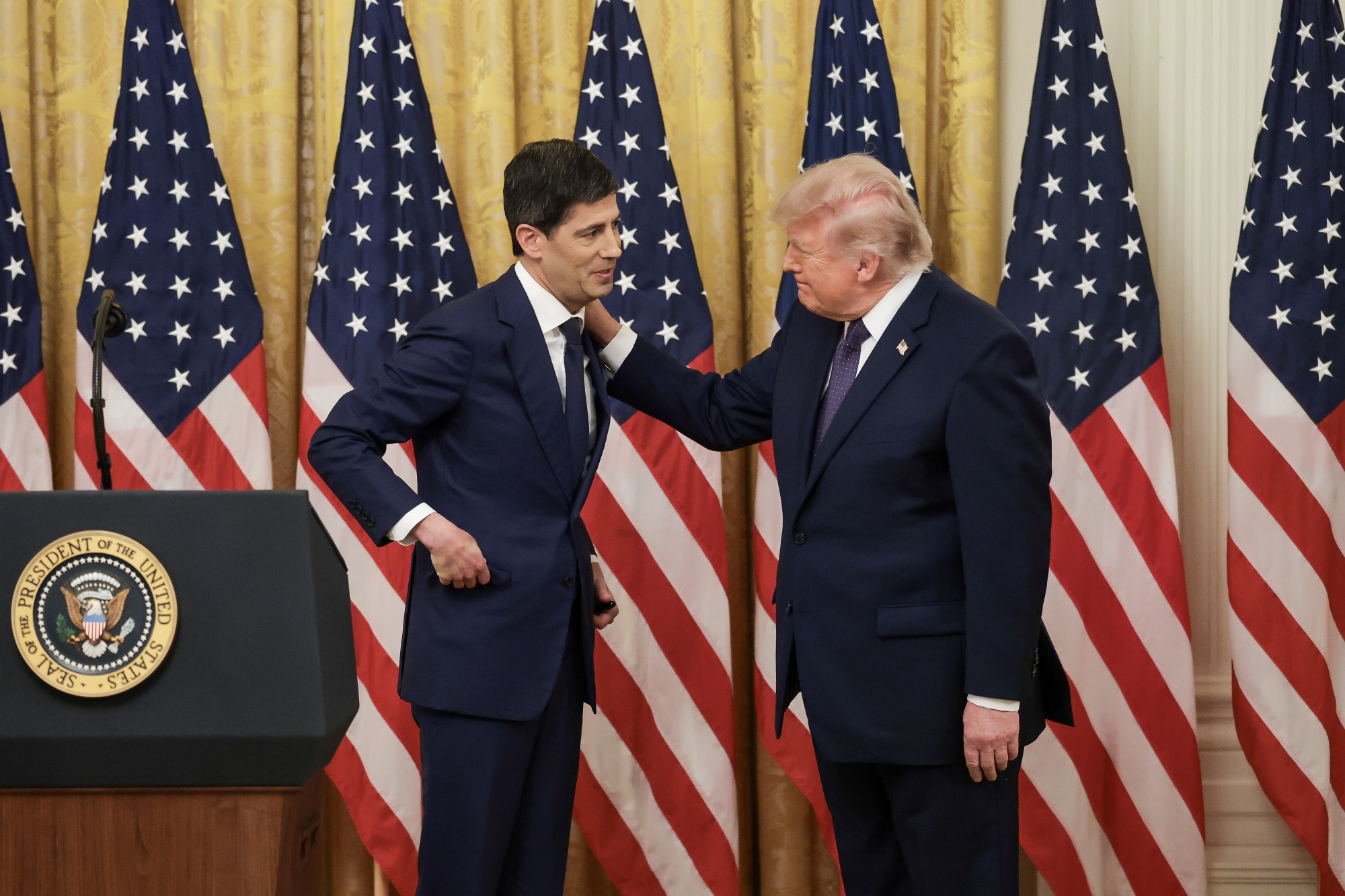 President Donald Trump speaks with the new Chairman of the Federal Reserve, Kevin Warsh after a swearing-in ceremony in the East Room of the White House on May 22, 2026 in Washington, DC. Photo by Anna Moneymaker/Getty Images