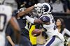Tommylee Lewis of the New Orleans Saints drops a pass broken up by Nickell Robey-Coleman of the Los Angeles Rams during the fourth quarter in the NFC Championship game on Jan. 20, in New Orleans.