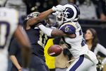 Tommylee Lewis of the New Orleans Saints drops a pass broken up by Nickell Robey-Coleman of the Los Angeles Rams during the fourth quarter in the NFC Championship game on Jan. 20, in New Orleans.
