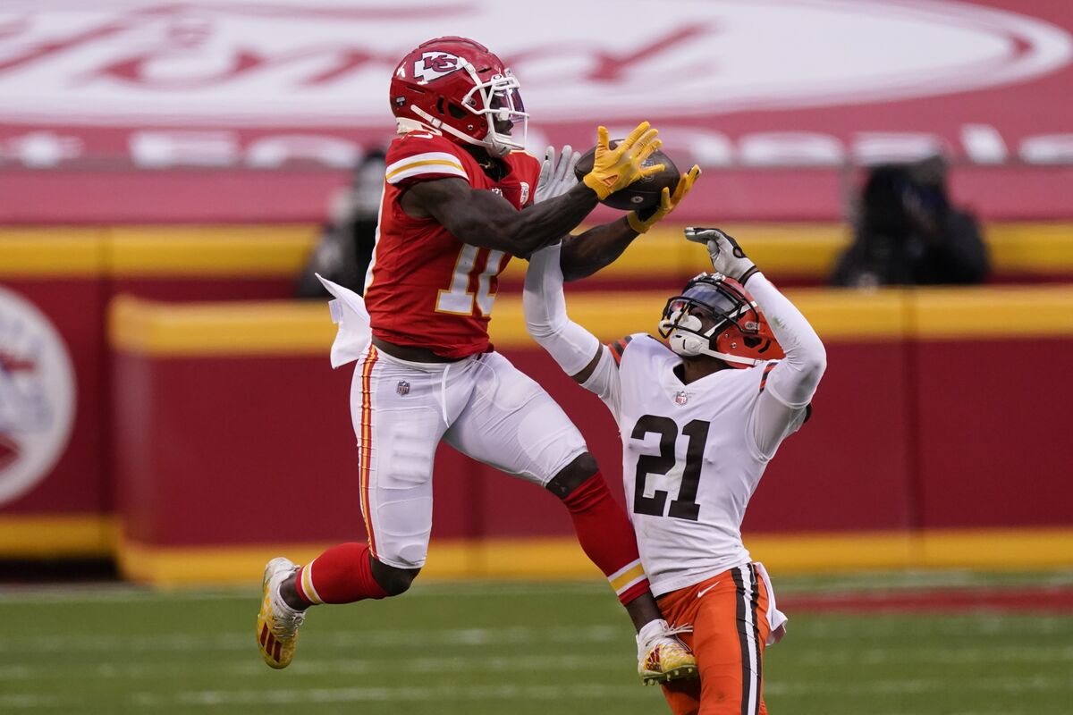 FILE - AFC wide receiver Tyreek Hill, of the Miami Dolphins, warms