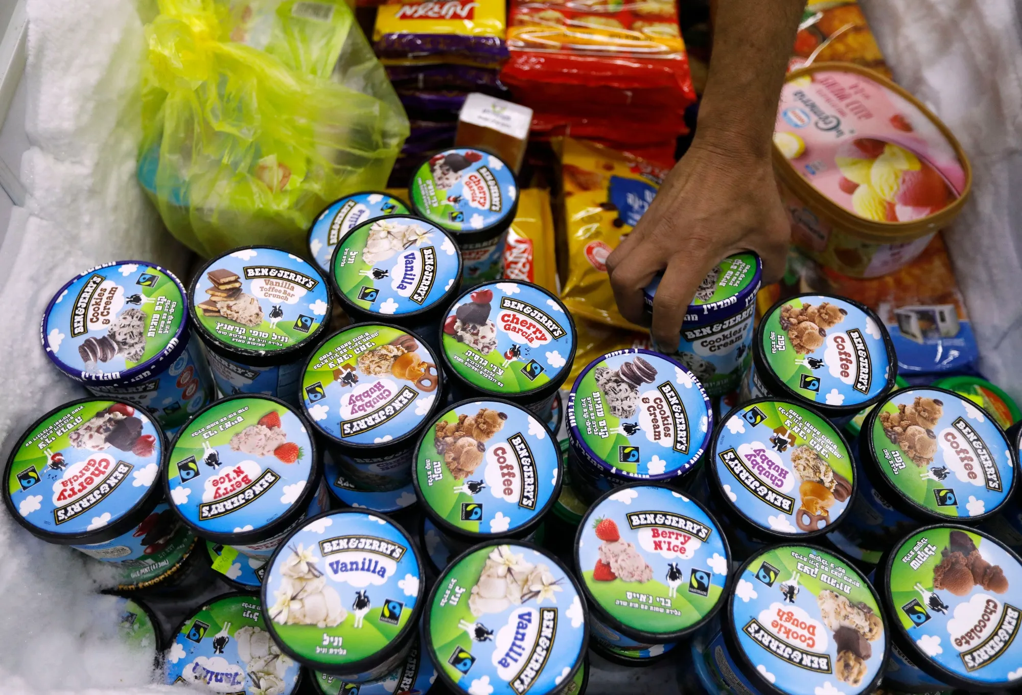 A person buys Ben &amp; Jerry's ice cream in Jerusalem.