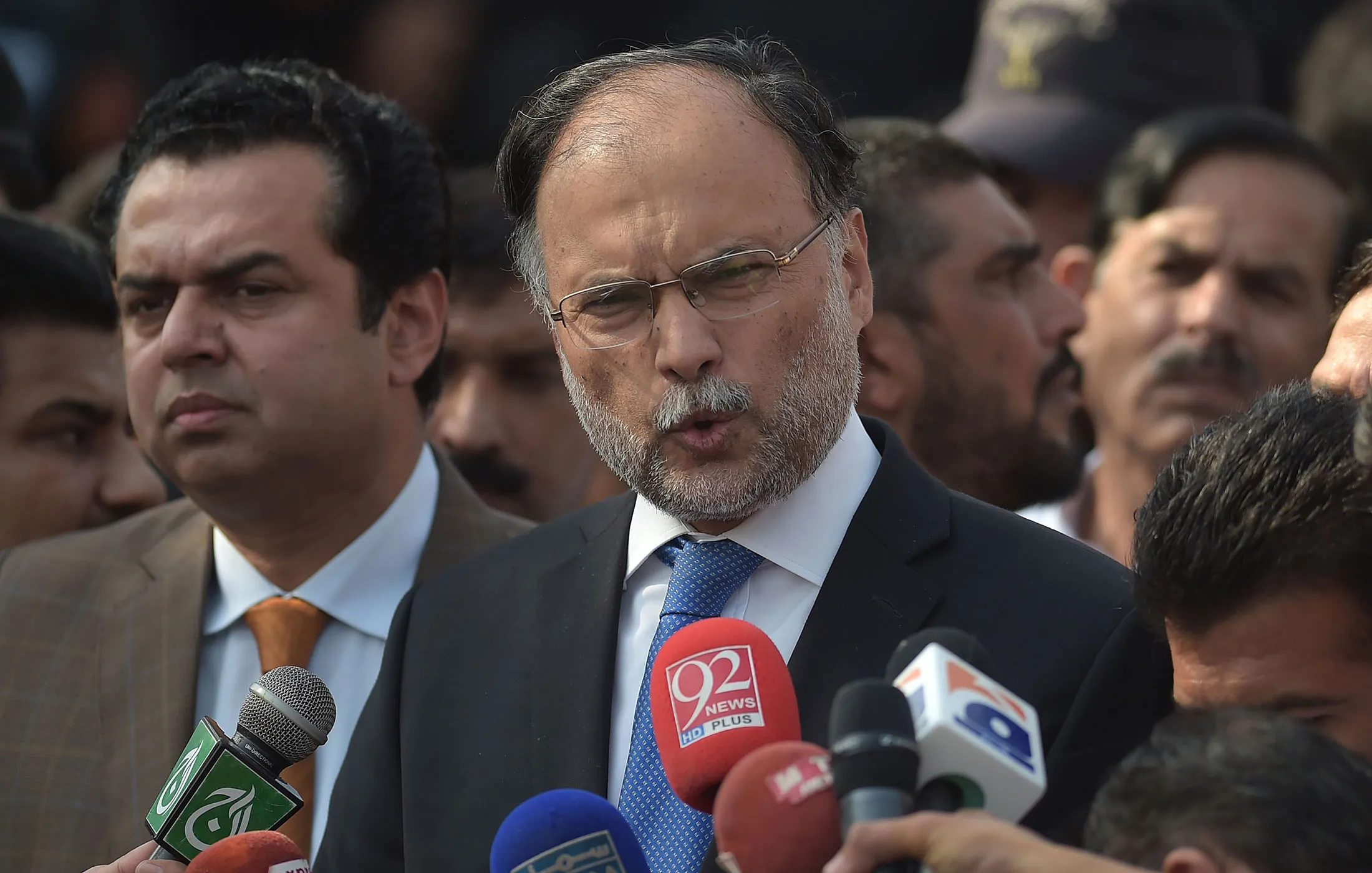 Pakistani Interior Minister Ahsan Iqbal speaks to media outside an accountability court where former prime minister Nawaz Sharif appeared to face corruption charges in Islamabad on Oct. 2, 2017.
