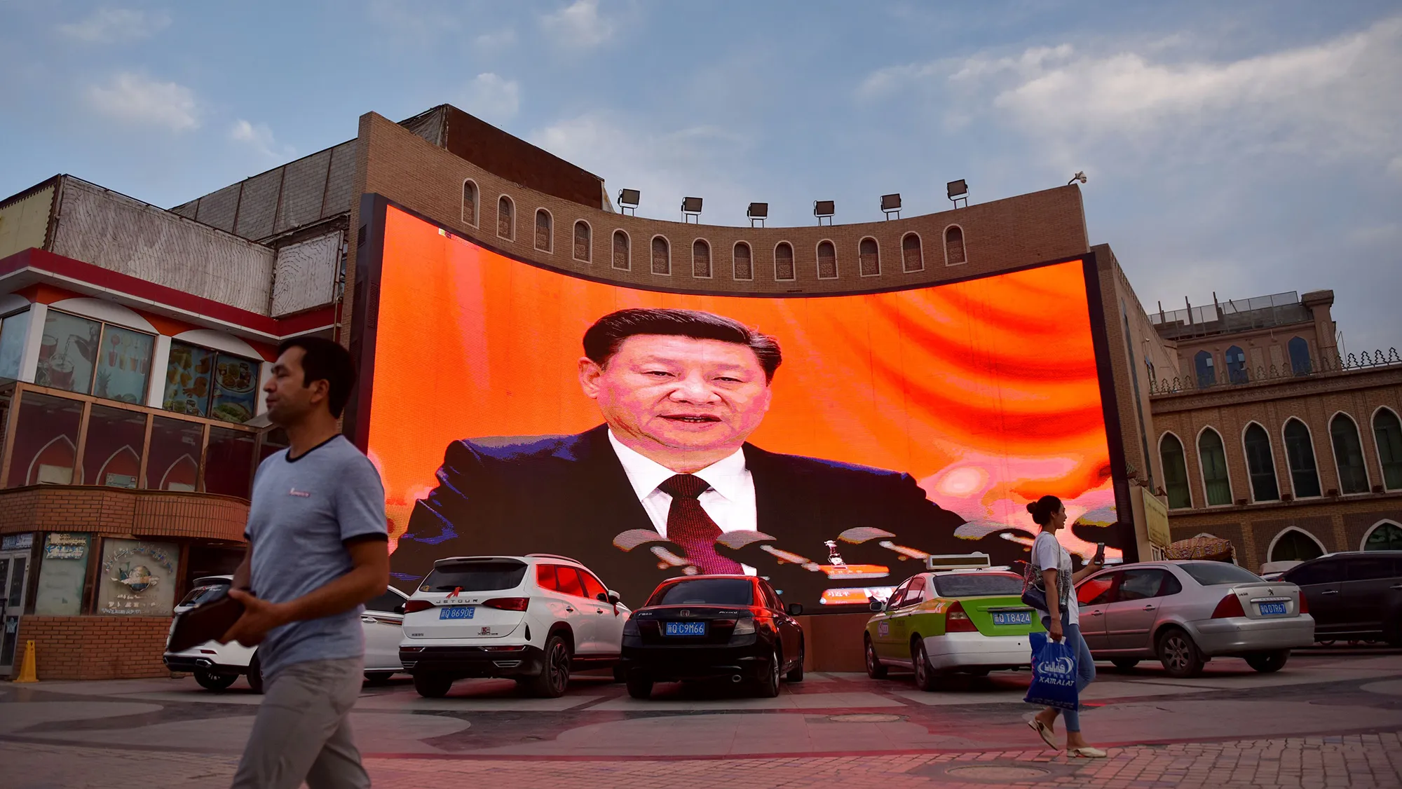 Chinese President Xi Jinping on a screen in Kashgar, Xinjiang.
