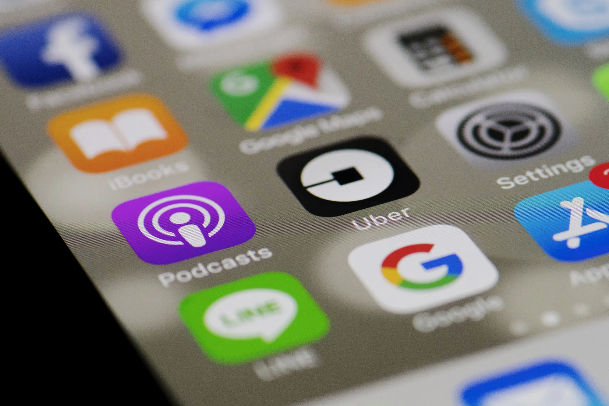 Views Of The Uber Technologies Inc. Application as Grab Looks To Acquire Uber's Business In Southeast Asia