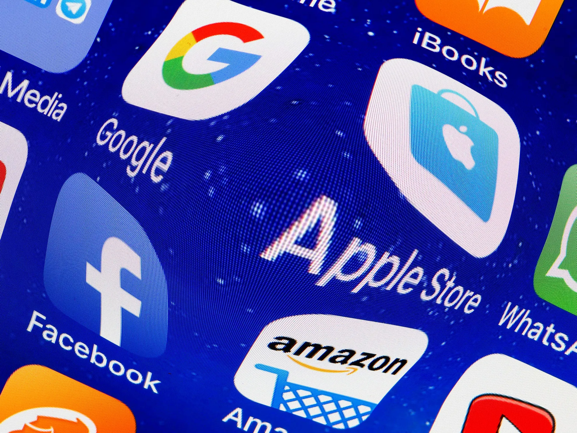 PARIS, FRANCE - MAY 31: In this photo illustration, logos of the Google, Apple, Facebook, and Amazon applications (GAFA) are displayed on the screen of an Apple iPhone on May 31, 2018 in Paris, France. The acronym GAFA refers to the four most powerful companies in the world of the internet: Google, Apple, Facebook and Amazon. The European Union has decided to better tax the giants of the internet with Brussels proposing to tax 3% of income generated by the data of users of Internet companies. This new tax would bring in 5 billion euros a year in the European Union. (Photo by Chesnot/Getty Images)