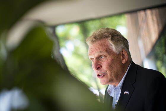 McAuliffe Says ‘Unpopular’ Biden Is a Drag on Virginia Race