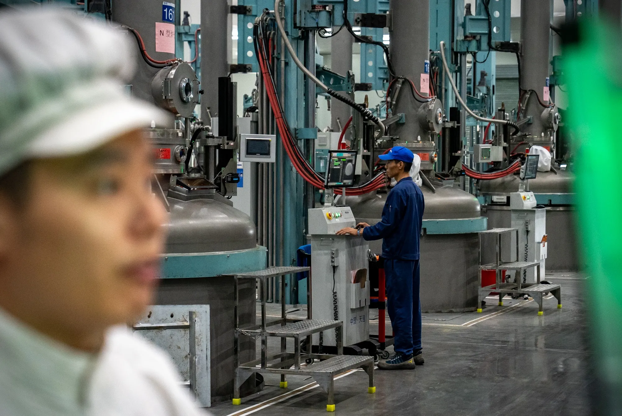 Workers at a GCL plant in the eastern Chinese city of Xuzhou.