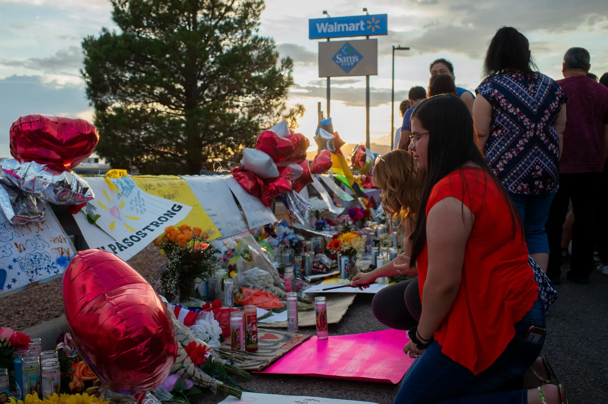 Mourners gather for a vigil outside the Walmart in El Paso on Aug. 7.