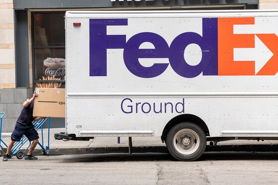 FedEx Cuts Forecast, Blaming Labor Shortages for Rising Costs