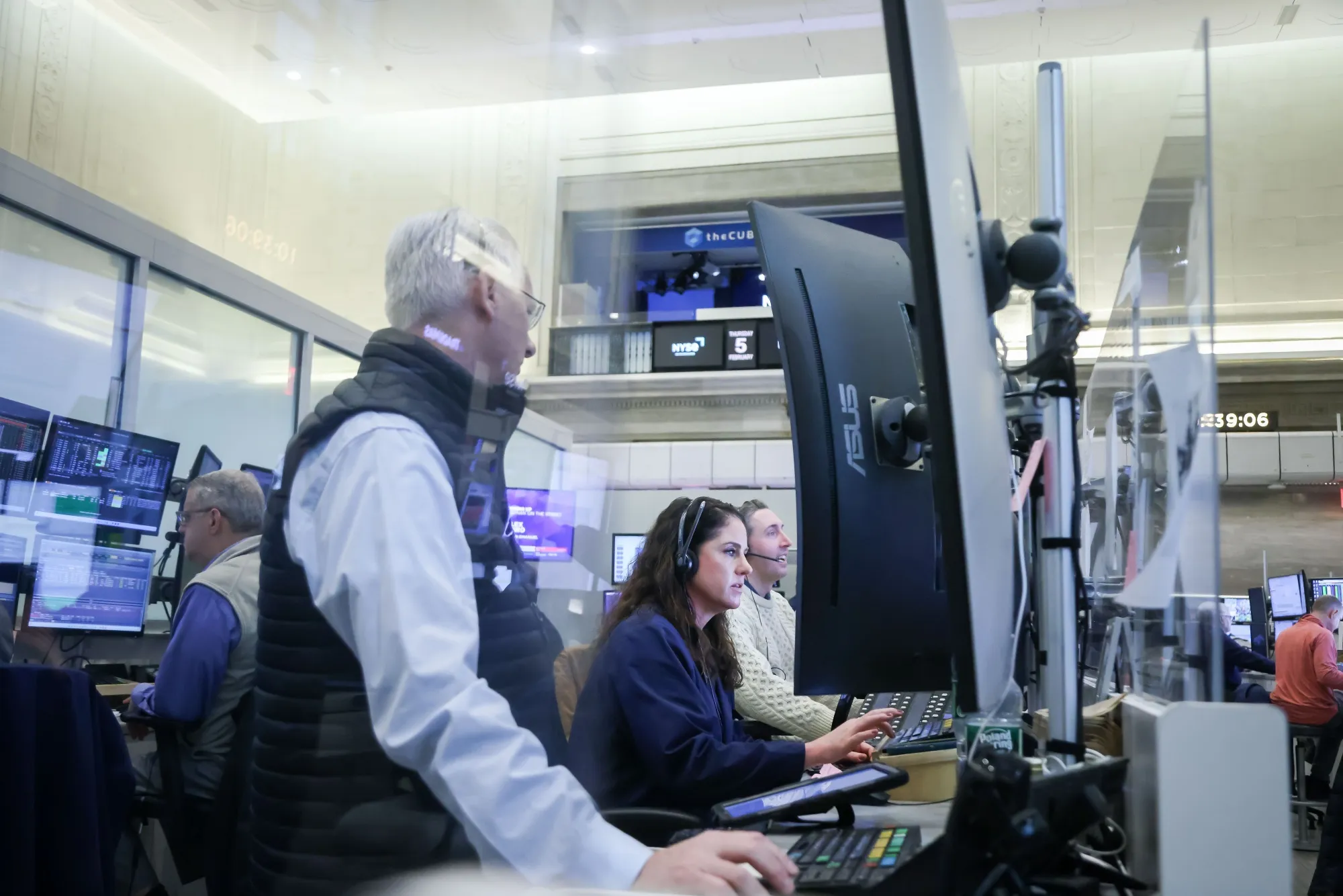 Traders work on the floor of the New York Stock Exchange.