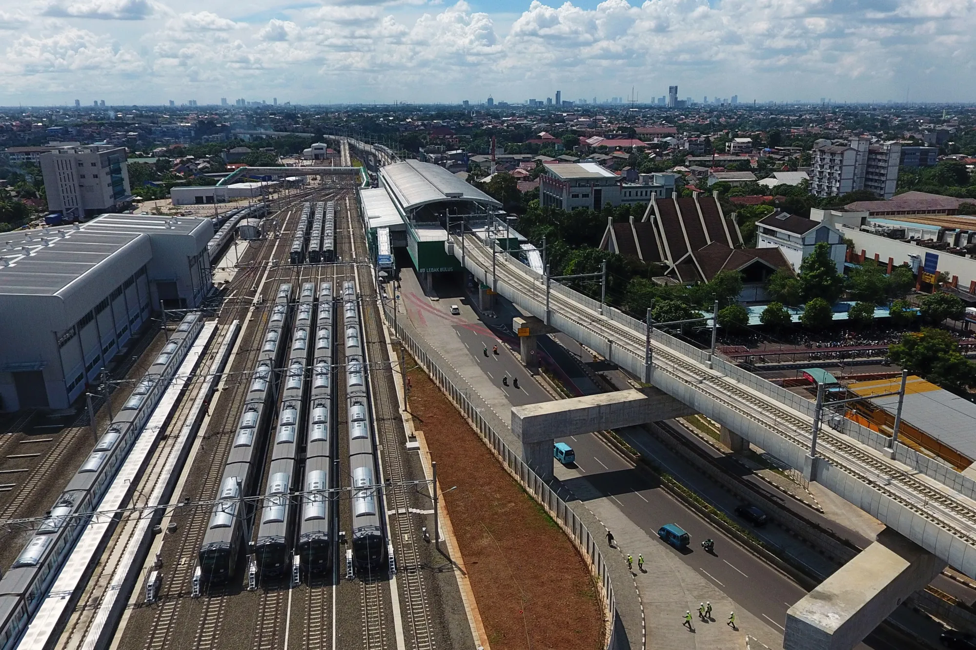 Jakarta Mass Rapid Transit (MRT) trains sit parked in a yard at Lebak Bulus Station in Jakarta.