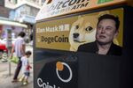 A sticker advertising Dogecoin on a cryptocurrency automated teller machine (ATM) at a laundromat in Hong Kong.