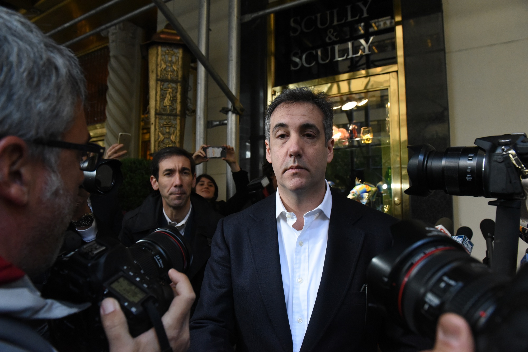 Michael Cohen exits his home in New York in 2019.
