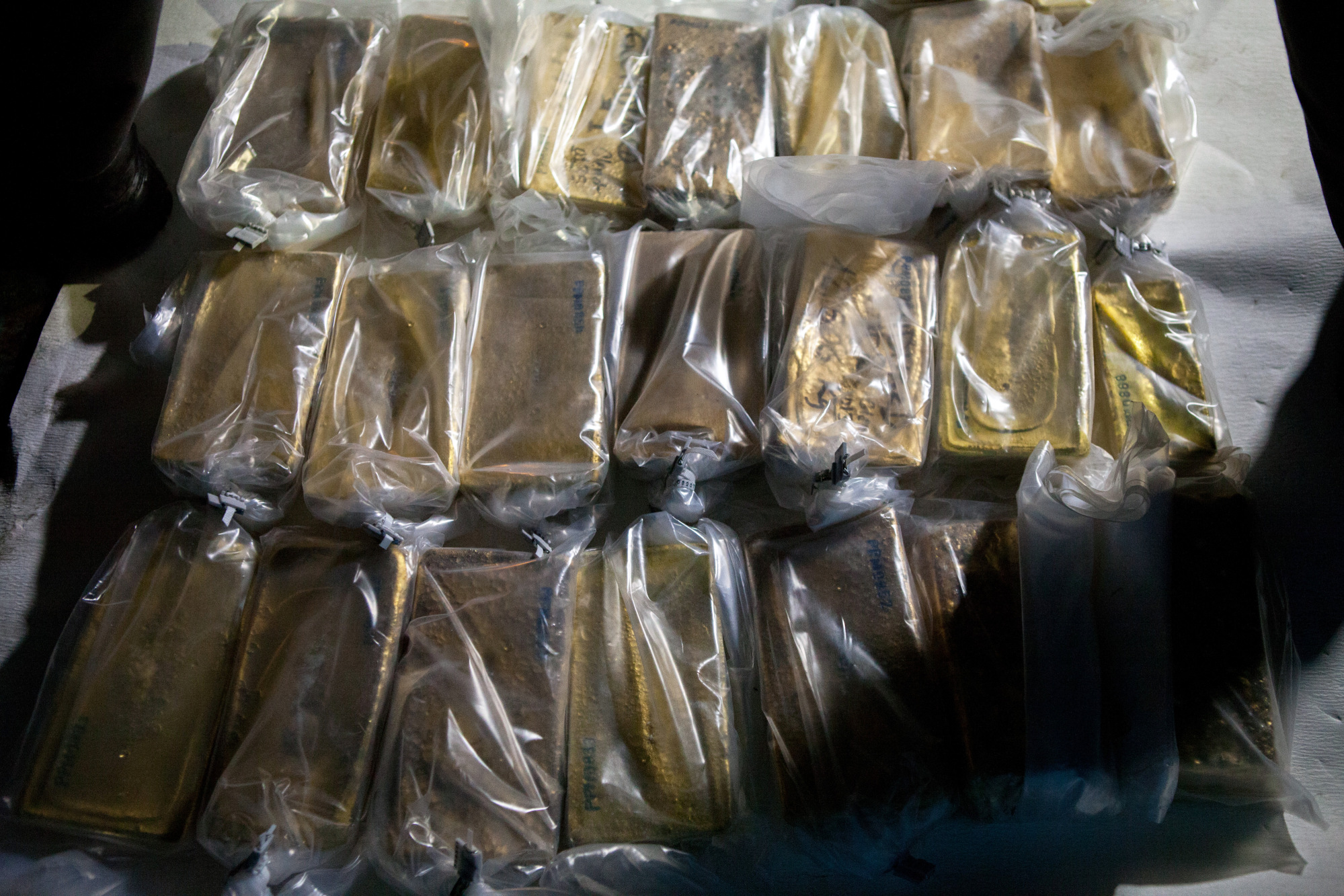 Gold bars wrapped in plastic are seen before being transported to the Central Bank of Venezuela&nbsp;in 2018.