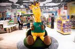 A Geoffrey the Giraffe plush toy sits on display at a Toys &quot;R&quot; Us Inc. store in Paramus, New Jersey.