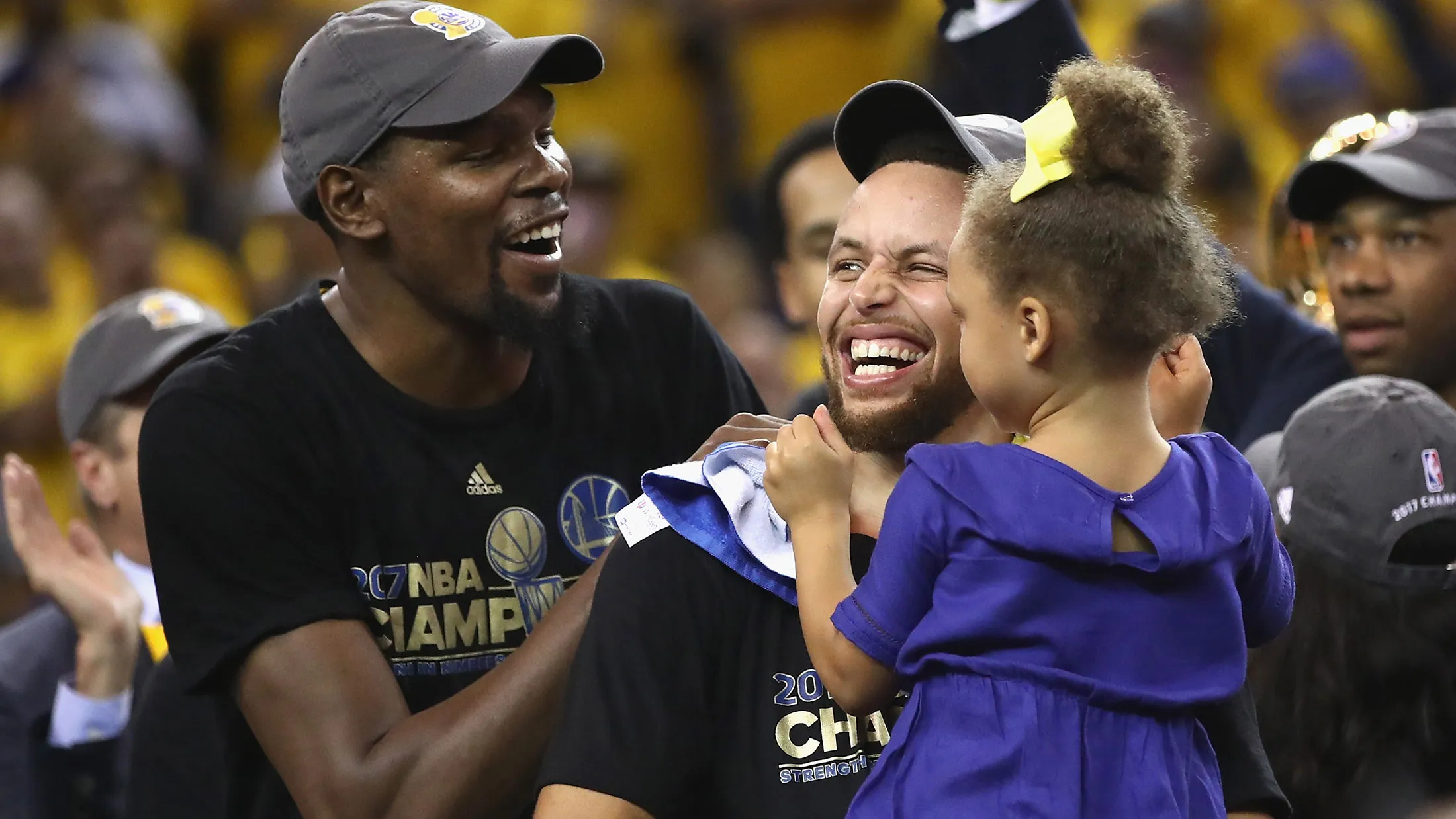 Kevin Durant and Steph Curry of the Golden State Warriors celebrate after defeating the Cleveland Cavaliers to win the NBA Finals on June 12, 2017, in Oakland.

