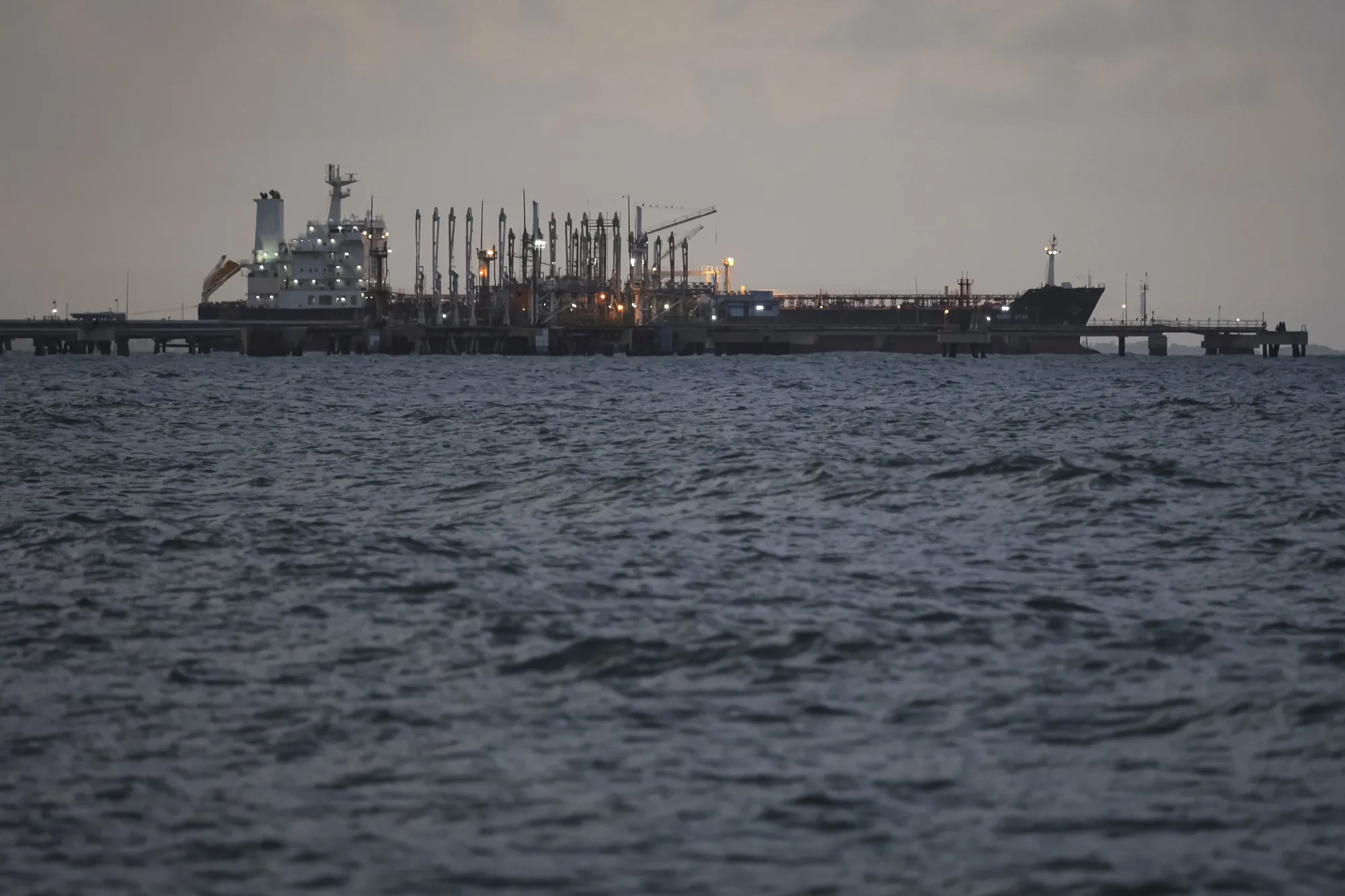 An oil tanker anchored at the dock of an oil refinery on Dec. 18&nbsp;in Puerto Cabello, Venezuela.