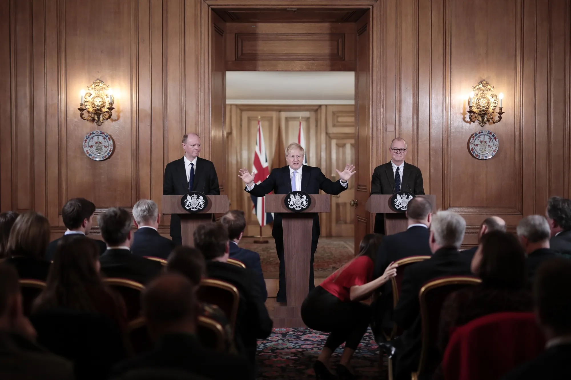 Boris Johnson, flanked by Chris Whitty, U.K. chief medical officer, left, and Patrick Vallance, U.K. lead science adviser, right, in London, on March 9.