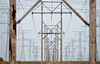 Electrical lines hang from transmission towers near the natural gas fired 1200-megawatt Kendall Energy power plant, owned by Dynegy Inc., in Minooka, Illinois, U.S.