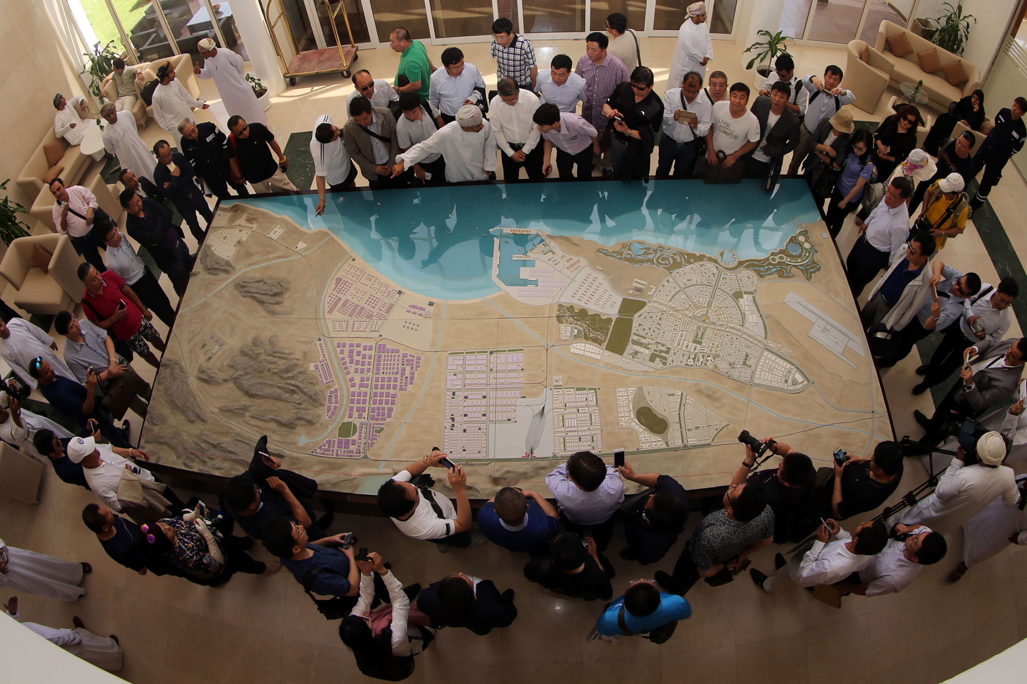 Investors look at a model of the proposed dock in&nbsp;Duqm, Oman,&nbsp;on May 24, 2016.