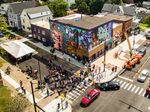 Aerial view of the community dedication celebration for Betsy Casañas's Patria, Será Porque Quisiera Que Vueles, Que Sigue Siendo Tuyo Mi Vuelo (Homeland, Perhaps It Is Because I Wish to See You Fly, That My Flight Continues To Be Yours) at 585 Niagara Street on August 25, 2017.