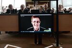 American National Security Agency (NSA) whistleblower Edward Snowden speaks to European officials via videoconference during a parliamentary hearing on mass surveillance at the European Council in Strasbourg, France, on April 8, 2014. Photographer: Frederick Florin/AFP via Getty Images