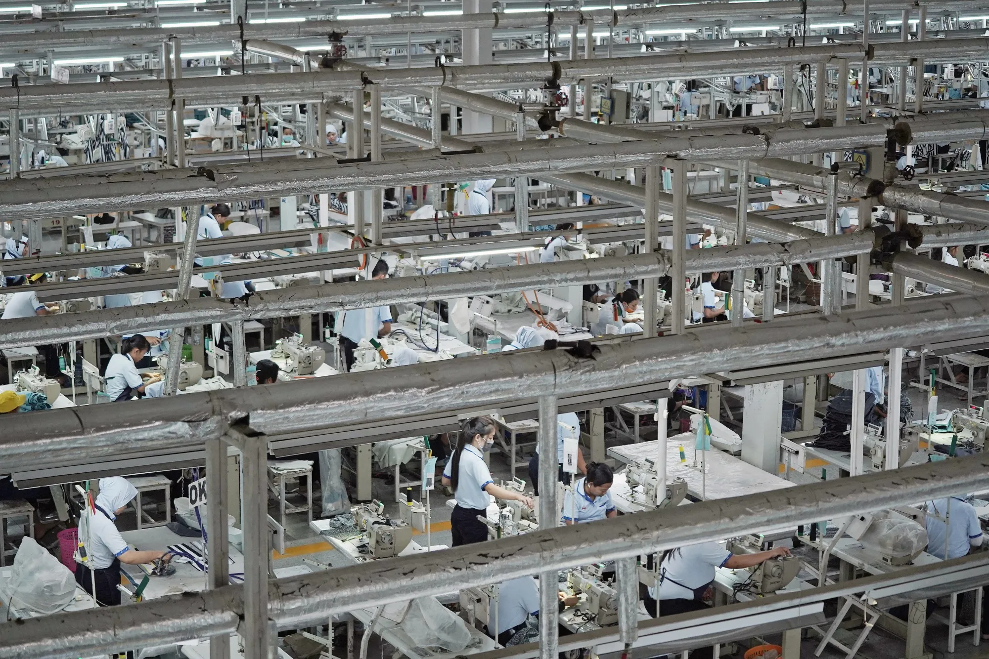 Workers operate sewing machines at the Sri Rejeki Isman factory in Solo, Central Java, in 2019.