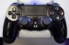 A Sony Corp. PlayStation 4 video game controller is displayed inside a GameStop Corp. store in Louisville, Kentucky, U.S., on Thursday, March 15, 2018. GameStop Corp. is scheduled to release earnings figures on March 28.