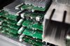 Cryptocurrency mining rig parts sit in a stack at the Bitfarms technology lab in Saint-Jean-sur-Richelieu, Quebec, Canada, on Thursday, July 26, 2018. Bitcoin has rallied more than 30 percent in July, shrugging off security and regulatory concerns that have plagued the virtual currency for much of this year.