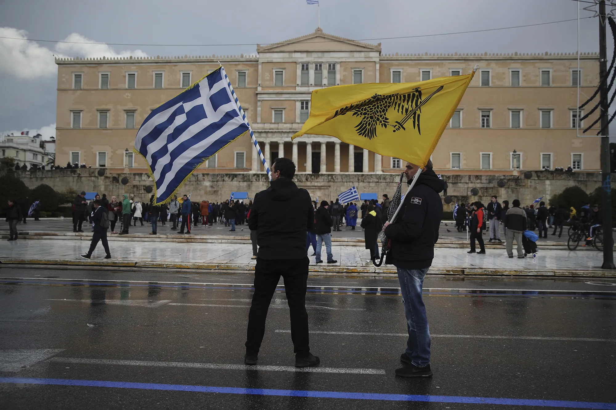 People protest outside the Greek Parliament, in Athens on&nbsp;Jan. 25, 2019.