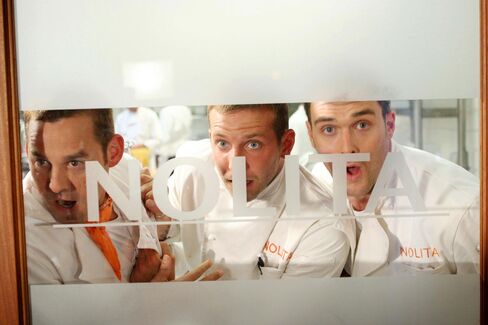 A still from the TV series Kitchen Confidential, which aired in 2005. From left to right: Nicholas Brendon, Bradley Cooper, and Owain Yeoman.
