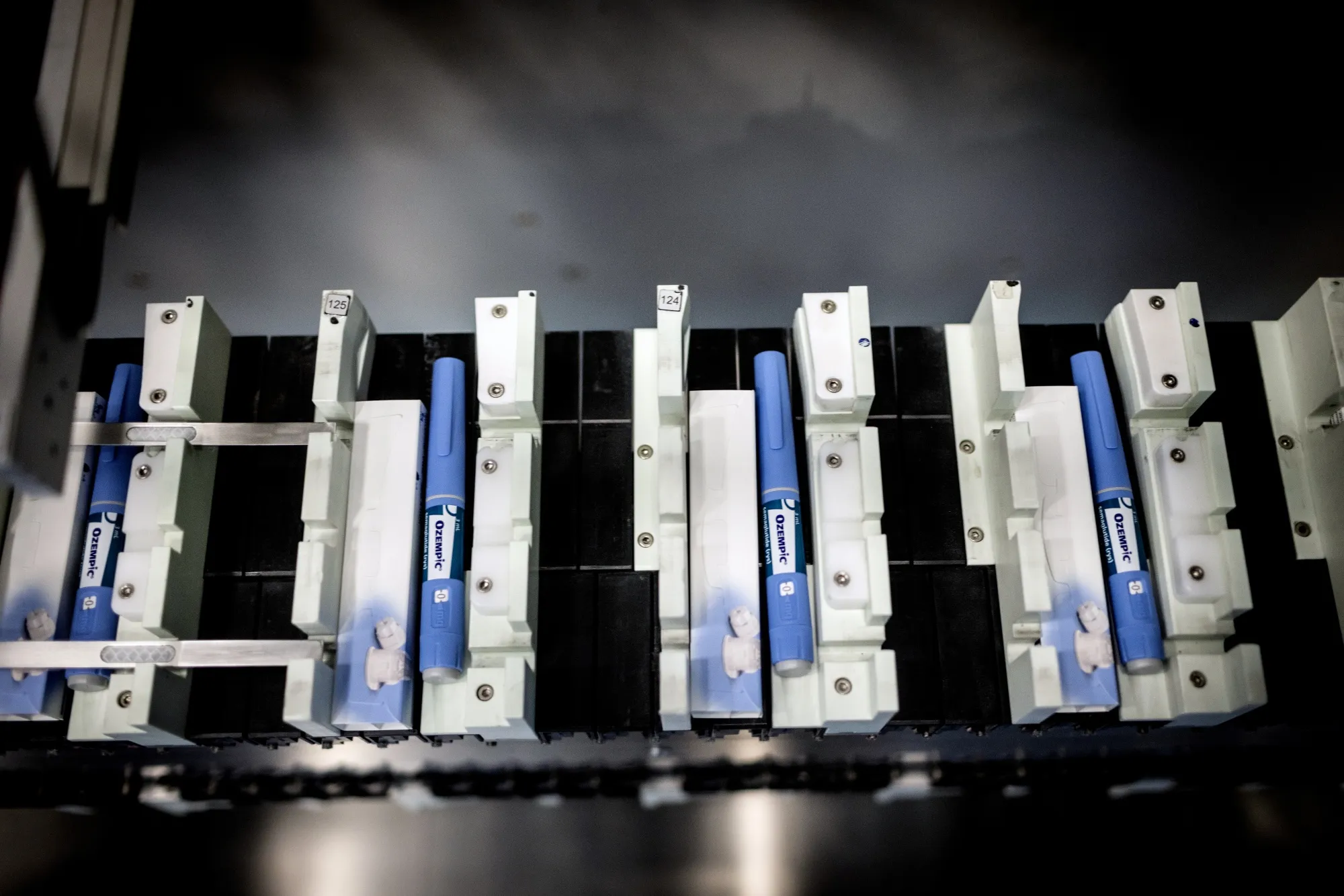 Ozempic injection pens on a conveyor at the Novo Nordisk A/S production facilities.
